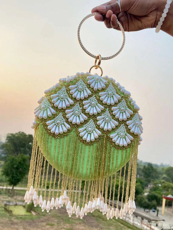 Matka Embroidered Design In Round Clutch